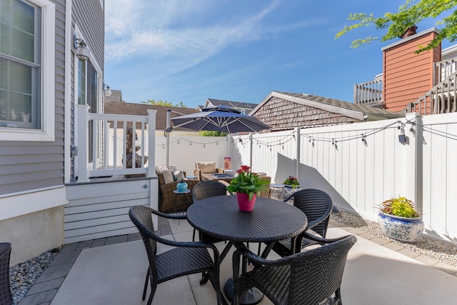 148 W Heather Rd Unit 148, Wildwood Crest, NJ 08260 - fenced backyard featuring outdoor dining area and a patio