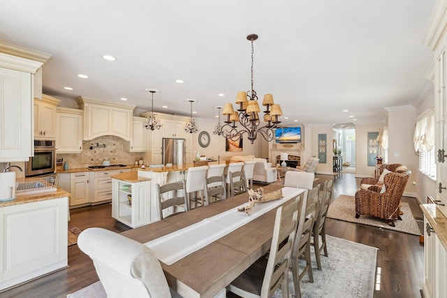 148 W Heather Rd Unit 148, Wildwood Crest, NJ 08260 - dining room featuring a chandelier, recessed lighting, dark wood-style floors, and crown molding