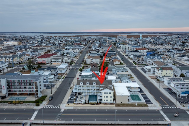 aerial view at dusk with a view of city