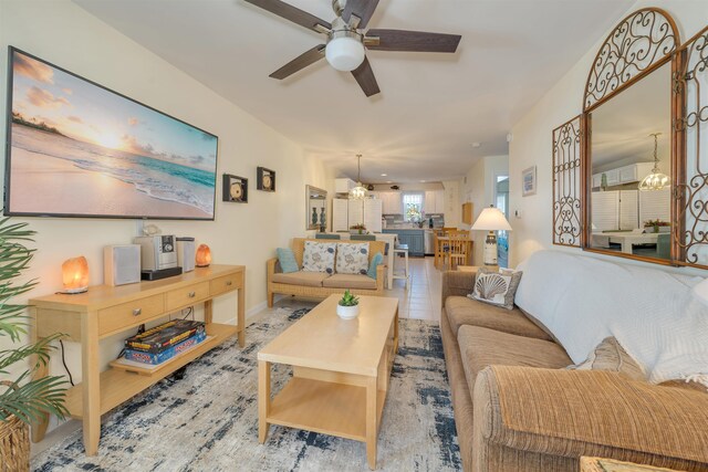 dining room featuring a ceiling fan and light tile patterned flooring