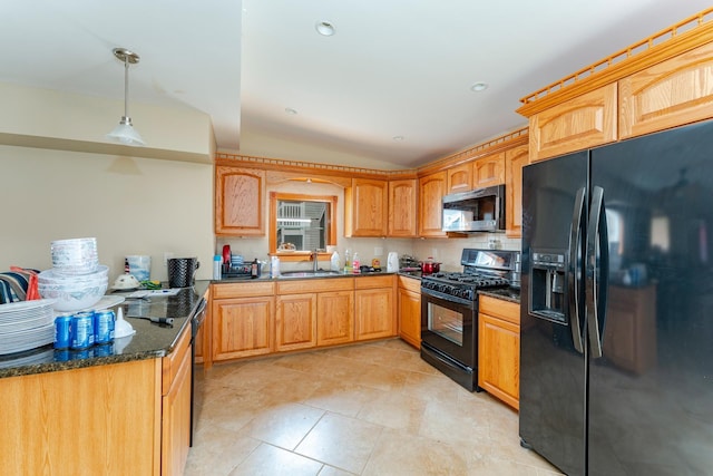 kitchen with sink, hanging light fixtures, tasteful backsplash, dark stone counters, and black appliances