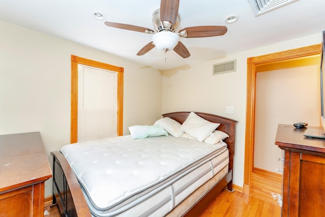 bedroom featuring ceiling fan and light wood-type flooring