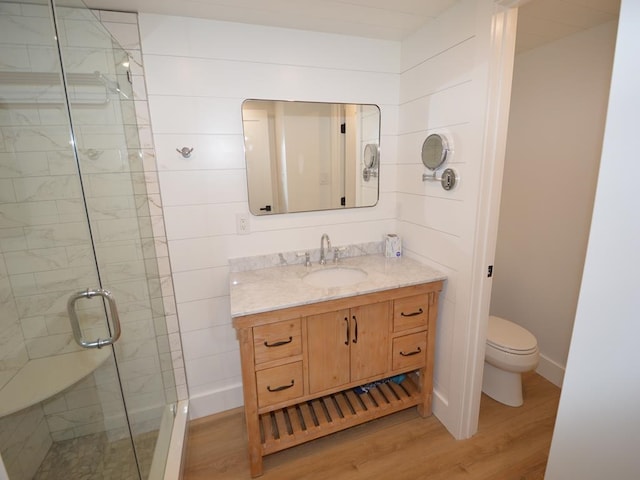 177 80th St Unit 104, Avalon, NJ 08202 - full bath with wood finished floors, a shower stall, vanity, and toilet