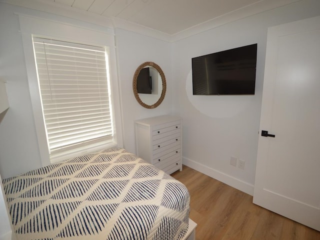 177 80th St Unit 104, Avalon, NJ 08202 - bedroom with light wood-style flooring and baseboards
