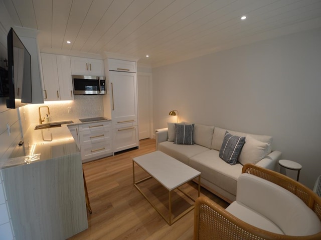 177 80th St Unit 104, Avalon, NJ 08202 - living area featuring light wood-style flooring and recessed lighting