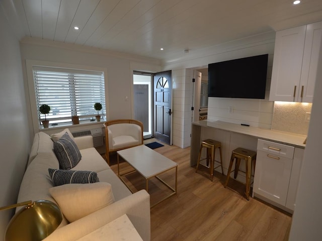 177 80th St Unit 104, Avalon, NJ 08202 - living area with light wood-type flooring, recessed lighting, and ornamental molding
