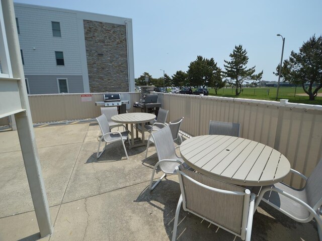 177 80th St Unit 104, Avalon, NJ 08202 - view of patio / terrace featuring outdoor dining space and area for grilling