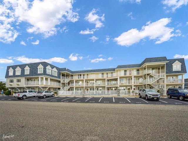 177 80th St Unit 104, Avalon, NJ 08202 - view of apartment building / complex featuring uncovered parking
