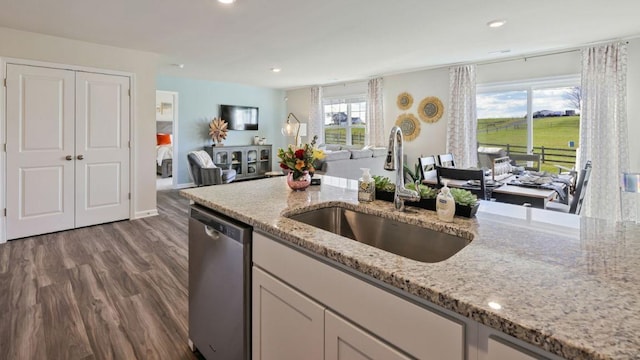 214 Bentz Ave, Villas, NJ 08251 - kitchen featuring stainless steel dishwasher, a sink, dark wood-type flooring, light stone countertops, and recessed lighting