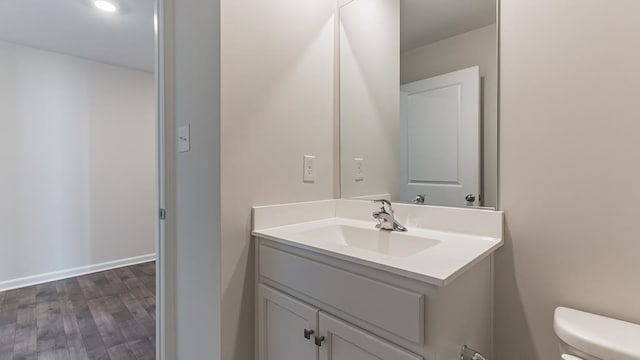 214 Bentz Ave, Villas, NJ 08251 - half bath featuring toilet, vanity, wood finished floors, and baseboards