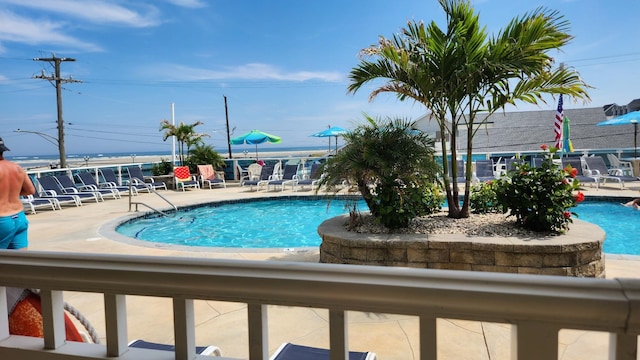 community pool featuring a patio
