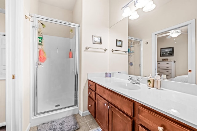 216 E Roberts Ave Unit 7, Wildwood, NJ 08260 - bathroom with a stall shower, vanity, tile patterned floors, and ceiling fan