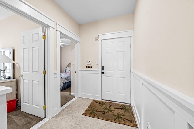 216 E Roberts Ave Unit 7, Wildwood, NJ 08260 - carpeted entryway with a wainscoted wall