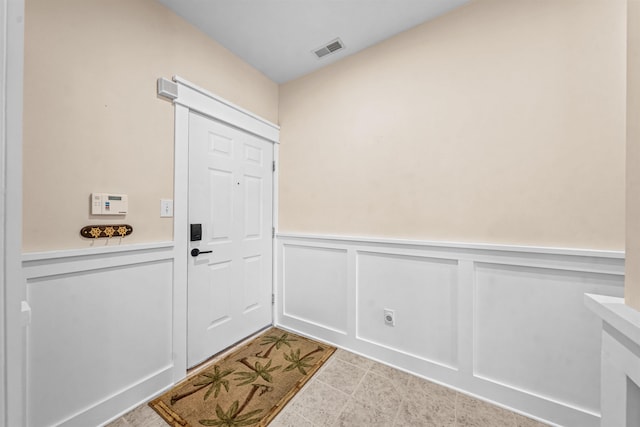 216 E Roberts Ave Unit 7, Wildwood, NJ 08260 - doorway with a decorative wall and wainscoting