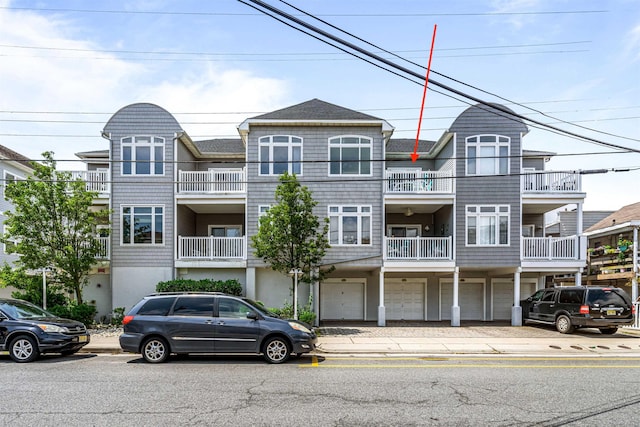 216 E Roberts Ave Unit 7, Wildwood, NJ 08260 - view of front of property with an attached garage and driveway