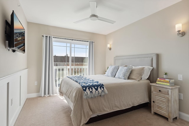 bedroom featuring light carpet and ceiling fan