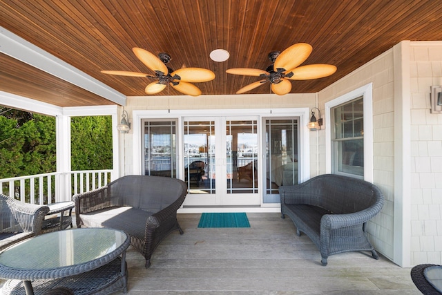 exterior space with wooden ceiling and a ceiling fan