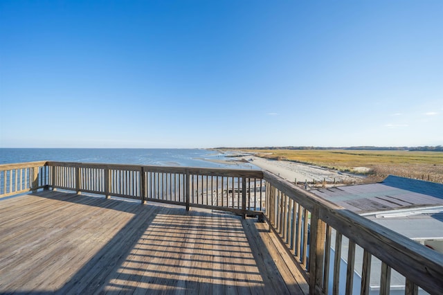 exterior space with a water view