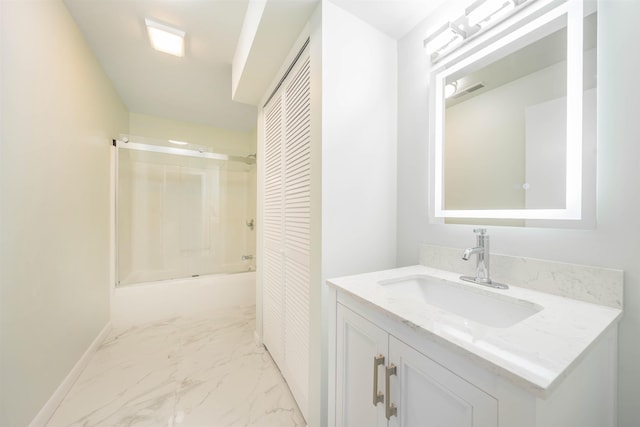 bathroom featuring vanity and tub / shower combination