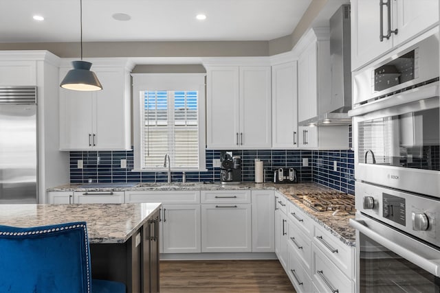 2958 Avalon Ave, Avalon, NJ 08202 - kitchen featuring appliances with stainless steel finishes, white cabinetry, dark wood-style flooring, recessed lighting, and backsplash