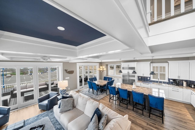 2958 Avalon Ave, Avalon, NJ 08202 - living area with wood finished floors, a chandelier, recessed lighting, ceiling fan, and a tray ceiling