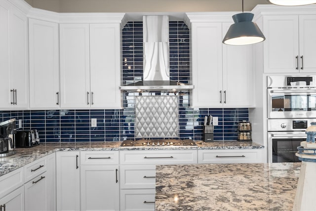 2958 Avalon Ave, Avalon, NJ 08202 - kitchen featuring wall chimney range hood, appliances with stainless steel finishes, white cabinetry, and backsplash