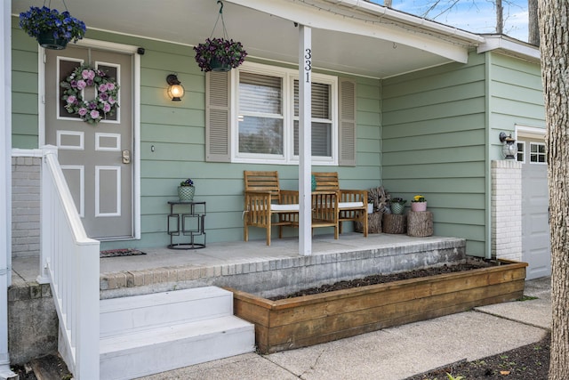 331 Holly Ln, Erma, NJ 08204 - view of exterior entry featuring a porch