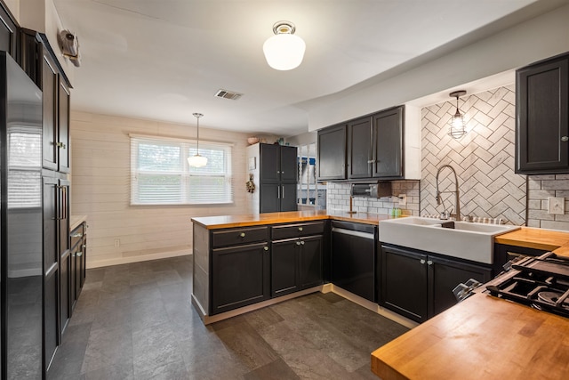 331 Holly Ln, Erma, NJ 08204 - kitchen with wooden counters, dishwasher, backsplash, a peninsula, and visible vents