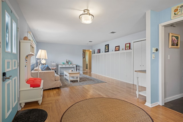 331 Holly Ln, Erma, NJ 08204 - interior space with baseboards, wood finished floors, and visible vents