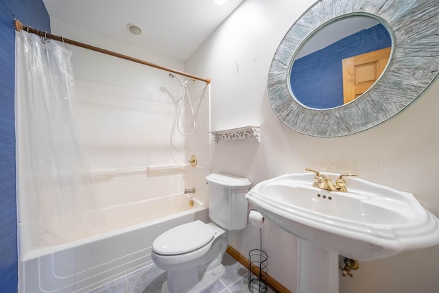 full bathroom featuring tile patterned flooring, toilet, shower / bathtub combination with curtain, and sink