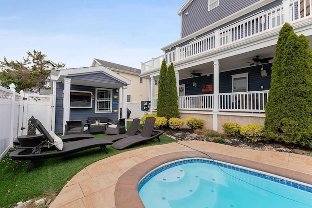 view of pool with ceiling fan