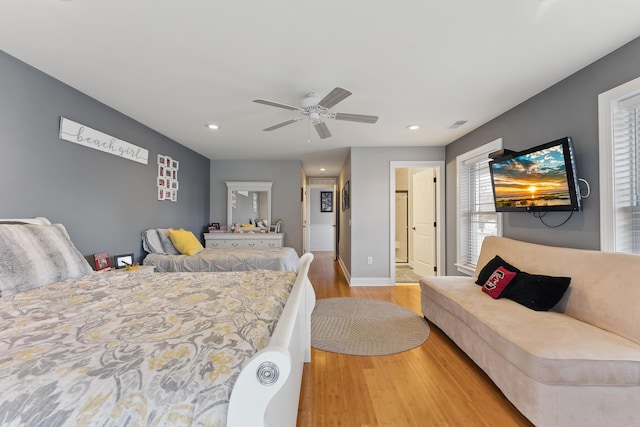 bedroom featuring ceiling fan and light wood-type flooring