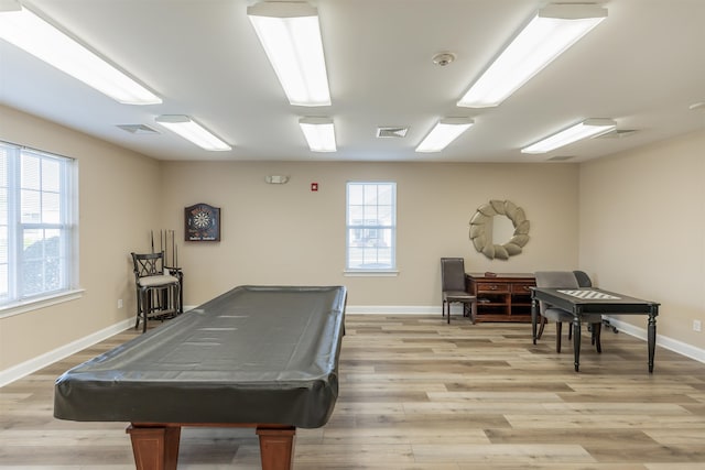 playroom featuring plenty of natural light, light wood-type flooring, and billiards