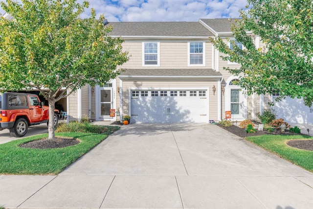 view of front of property with a garage