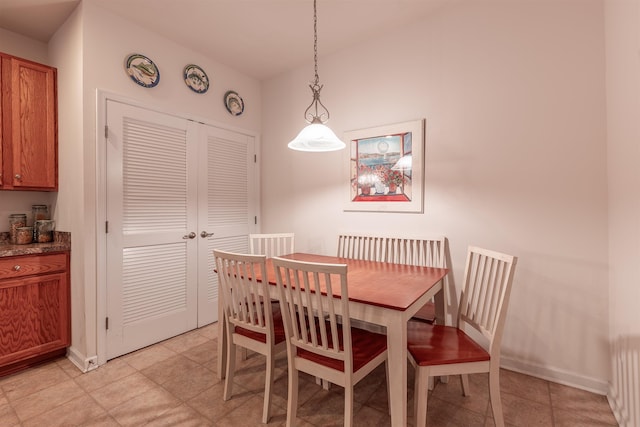 dining room featuring radiator