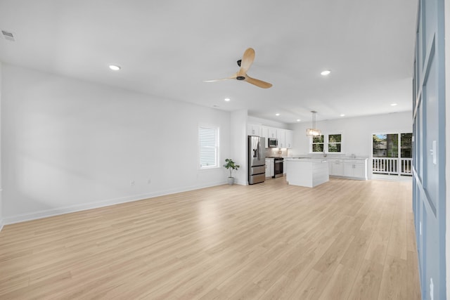 11 Oak Ave, Villas, NJ 08251 - unfurnished living room featuring a healthy amount of sunlight, ceiling fan, recessed lighting, and light wood-style floors