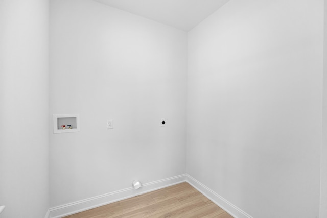 11 Oak Ave, Villas, NJ 08251 - clothes washing area featuring hookup for an electric dryer, washer hookup, laundry area, light wood-style flooring, and baseboards