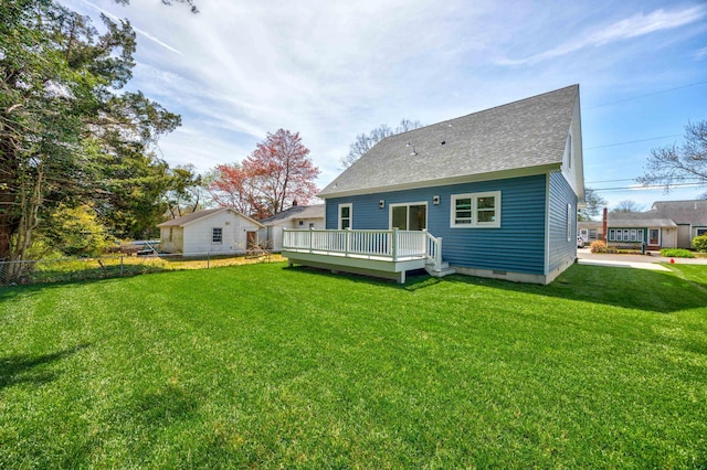 11 Oak Ave, Villas, NJ 08251 - back of property with fence, a shingled roof, a yard, and a deck