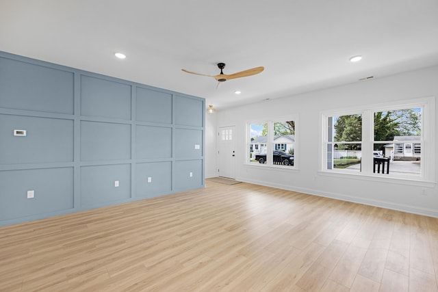 11 Oak Ave, Villas, NJ 08251 - unfurnished living room with recessed lighting, a decorative wall, light wood-style floors, baseboards, and a ceiling fan