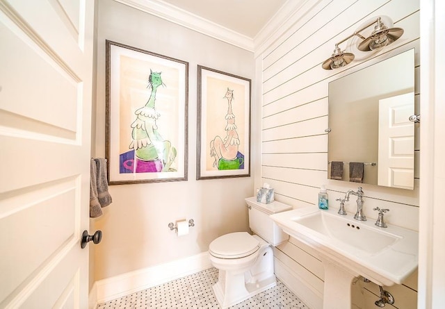 187 104th St, Stone Harbor, NJ 08247 - half bath featuring ornamental molding, tile patterned floors, and wood walls