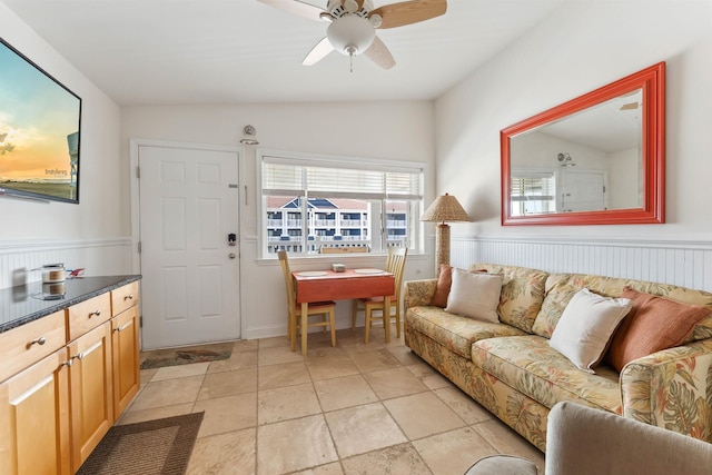 7929 Dune Dr Unit 310, Avalon, NJ 08202 - living area featuring a ceiling fan, wainscoting, and vaulted ceiling