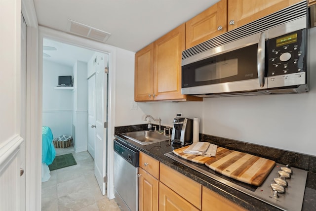 7929 Dune Dr Unit 310, Avalon, NJ 08202 - kitchen featuring stainless steel appliances, light brown cabinets, and dark stone counters