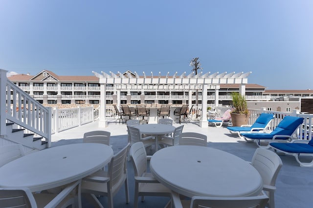 7929 Dune Dr Unit 310, Avalon, NJ 08202 - view of patio with outdoor dining space and stairway