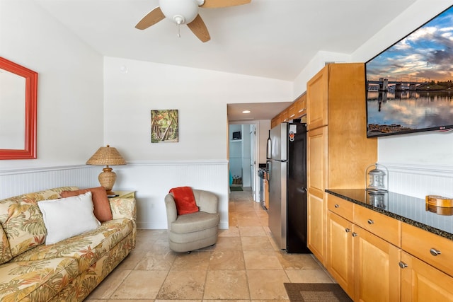 7929 Dune Dr Unit 310, Avalon, NJ 08202 - living area with a ceiling fan, wainscoting, and lofted ceiling