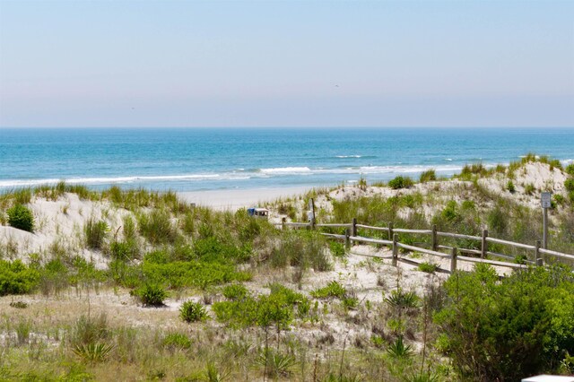 property view of water with a beach view