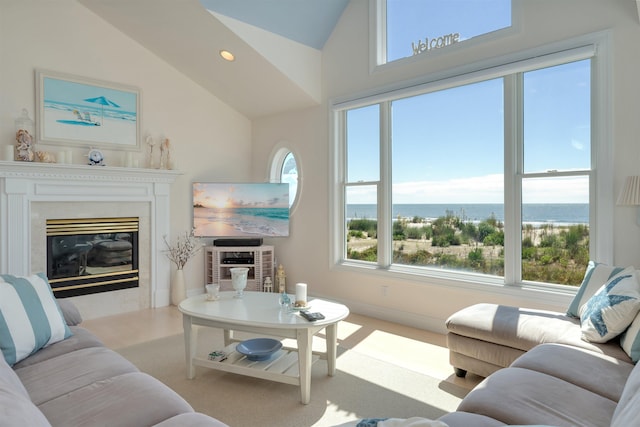 living room with a fireplace and vaulted ceiling