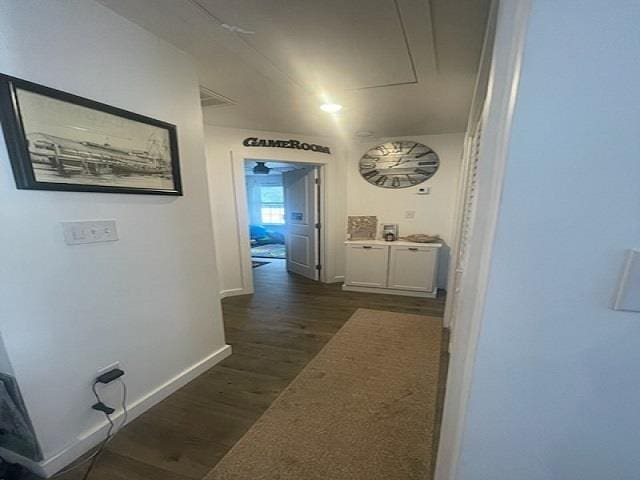 hallway featuring dark hardwood / wood-style floors