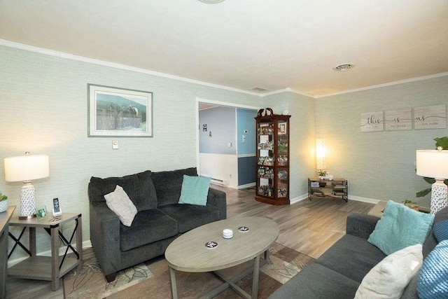 living room featuring crown molding and hardwood / wood-style floors