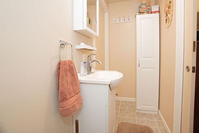 bathroom with vanity and tile patterned floors