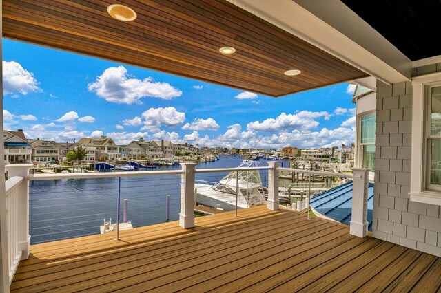 243 N Point Rd, Ocean City, NJ 08226 - view of dock featuring a balcony and a water view